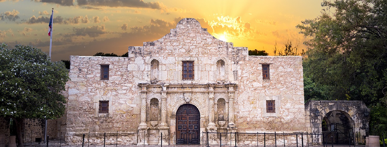 The front of the Alamo at sunset.