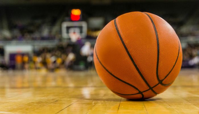 Close up of basketball on the court.