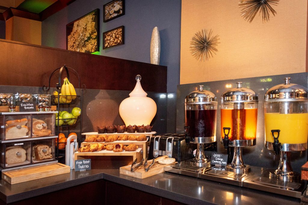 Breakfast pastries, bread, and juice at Oro Restaurant and Bar.