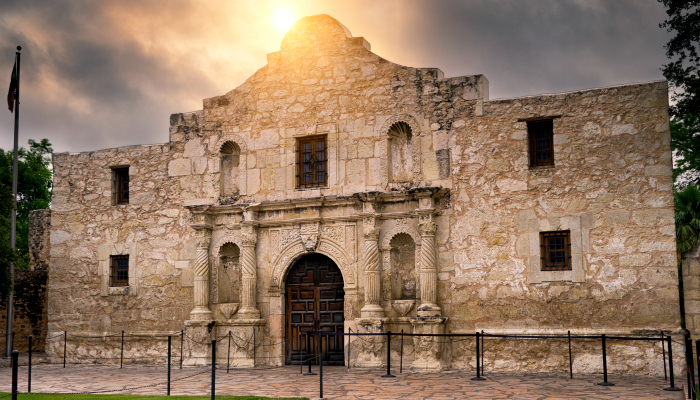 The front of the Alamo at sunset.