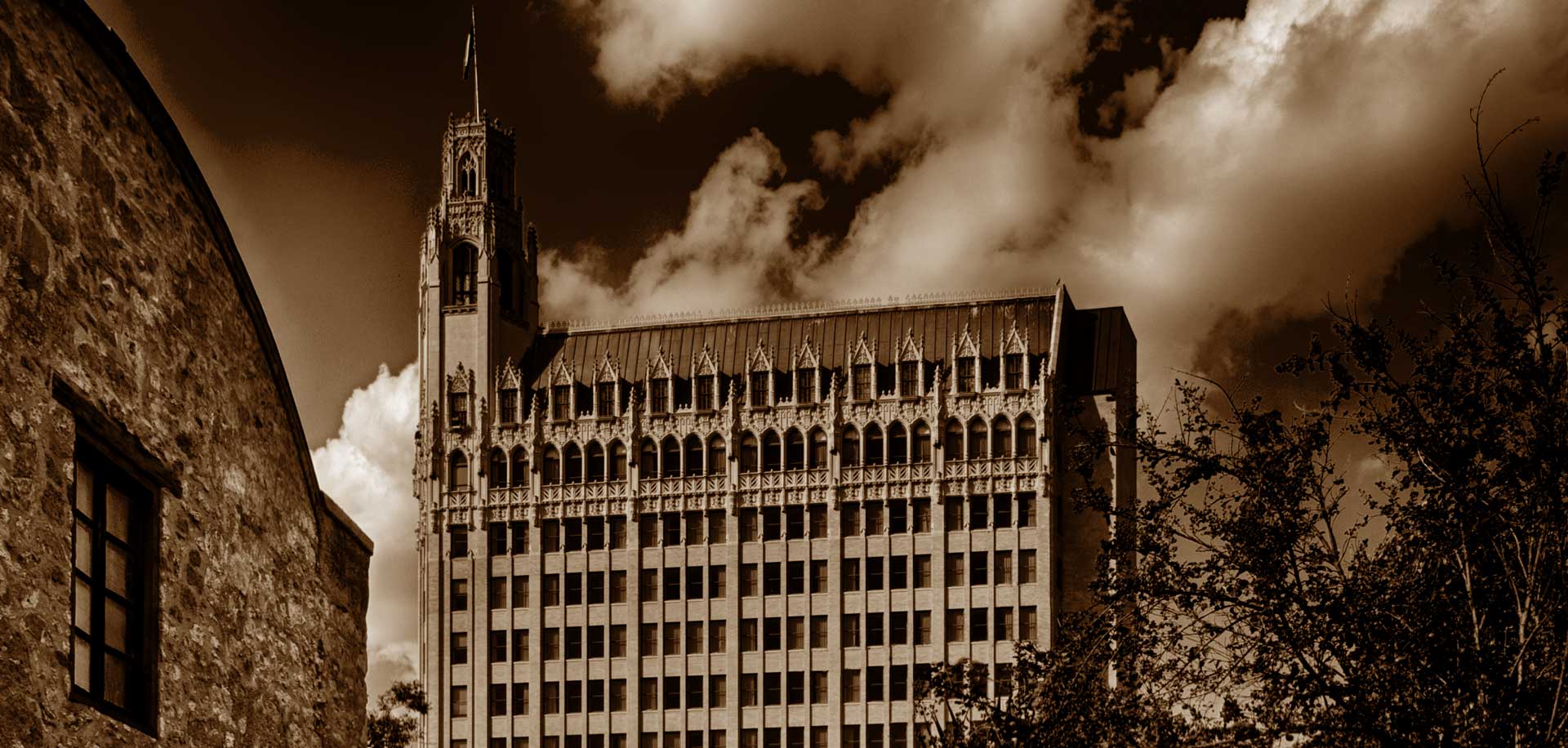 Emily Morgan Hotel against a cloudy sky.