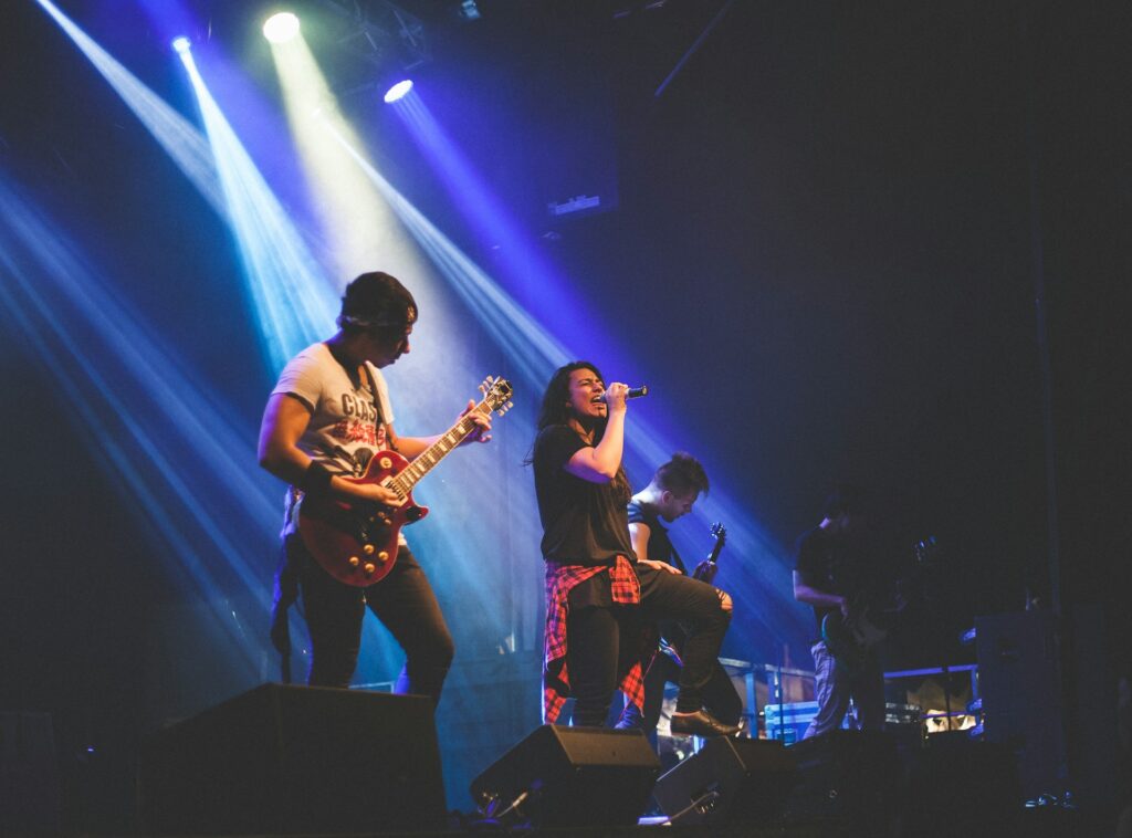 Rock band playing a concert.